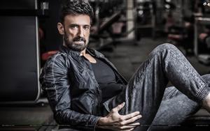 Rahul Dev - an Indian film actor looks intense in a shot